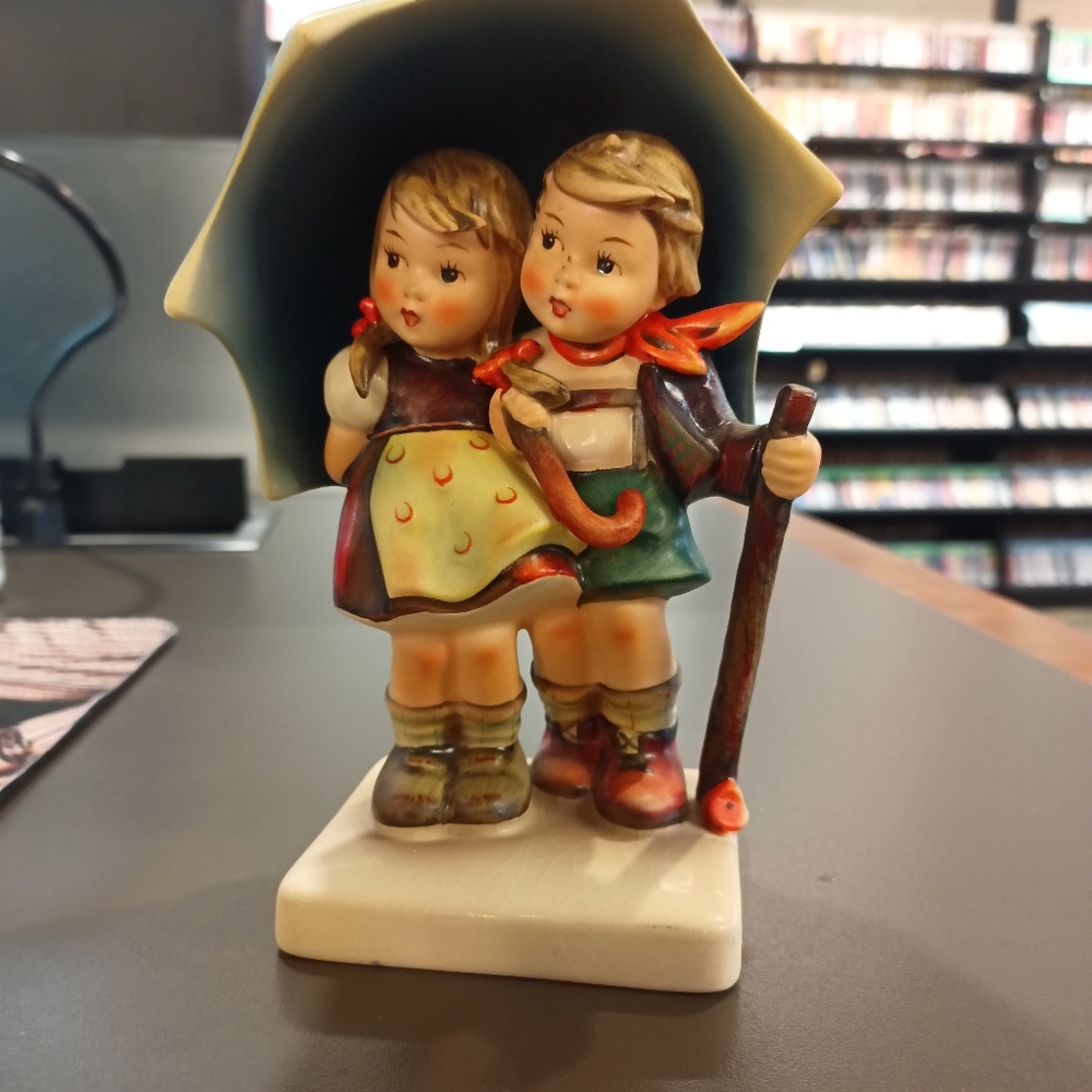 Stormy Weather Hummel.  Beautiful piece made in Germany.  Vintage.